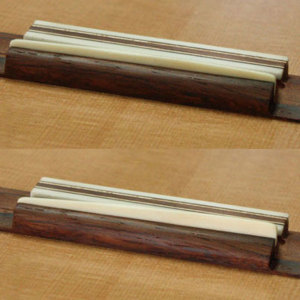 Saddles compared: with twist-plane fingerboard (top) and without (bottom).